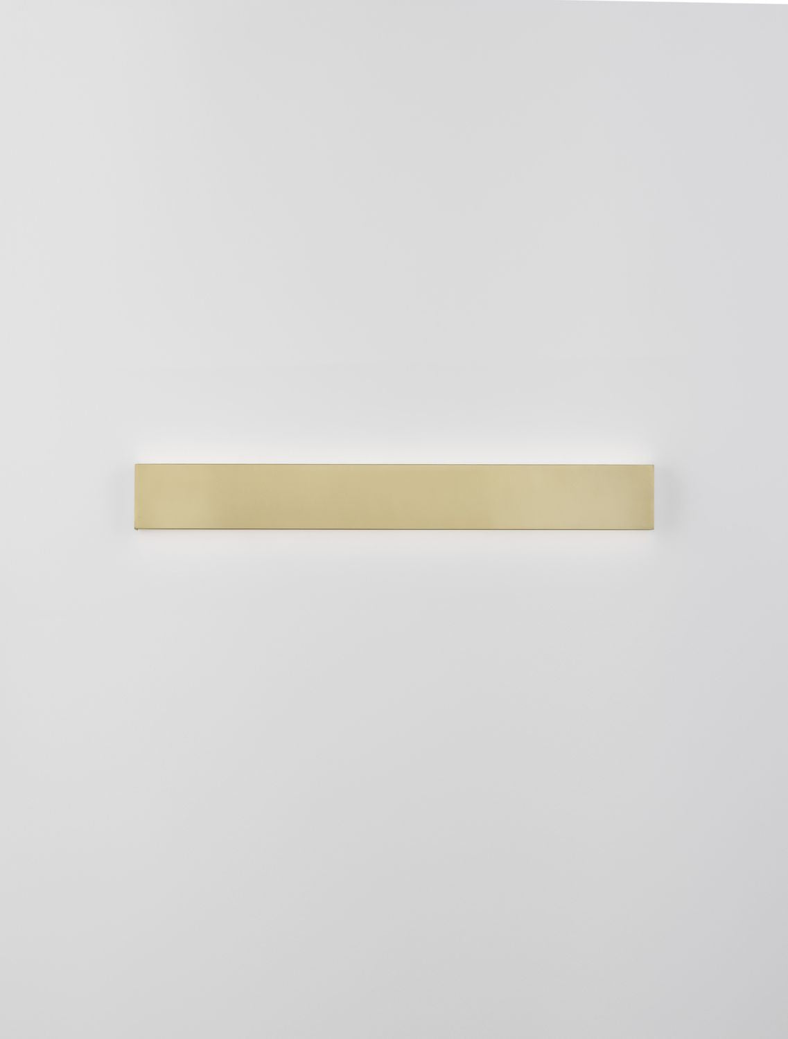 Détail de la face dorée mate et de la lumière diffusée vers le bas