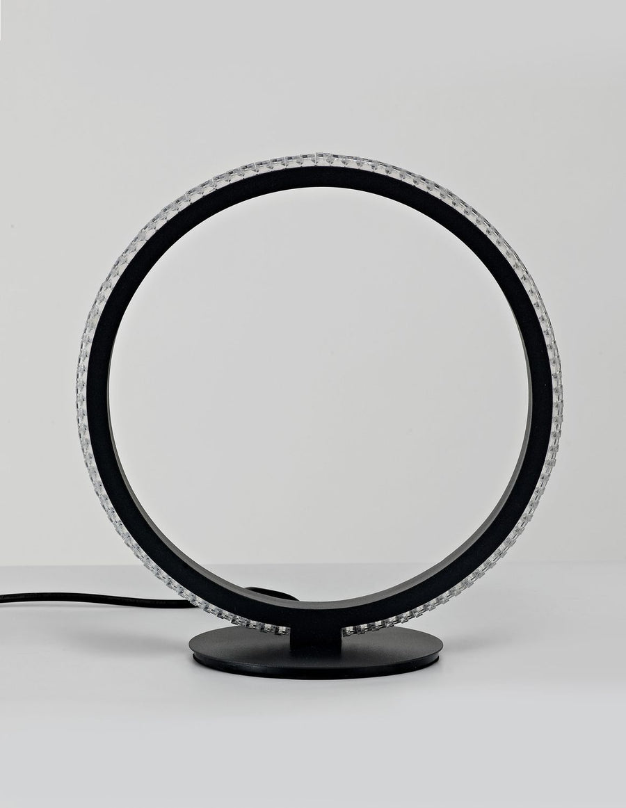Vue de trois quarts montrant l'anneau lumineux et son socle rond