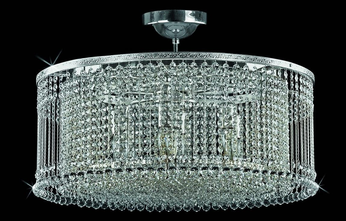 Version chromée du plafonnier, abat-jour cylindrique en cristal, monture argentée brillante.