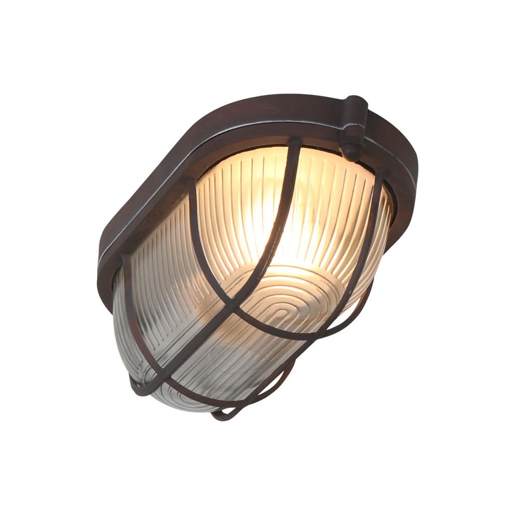 Vue en plongée de trois quarts, lumière chaude traversant le verre rainuré bombé.