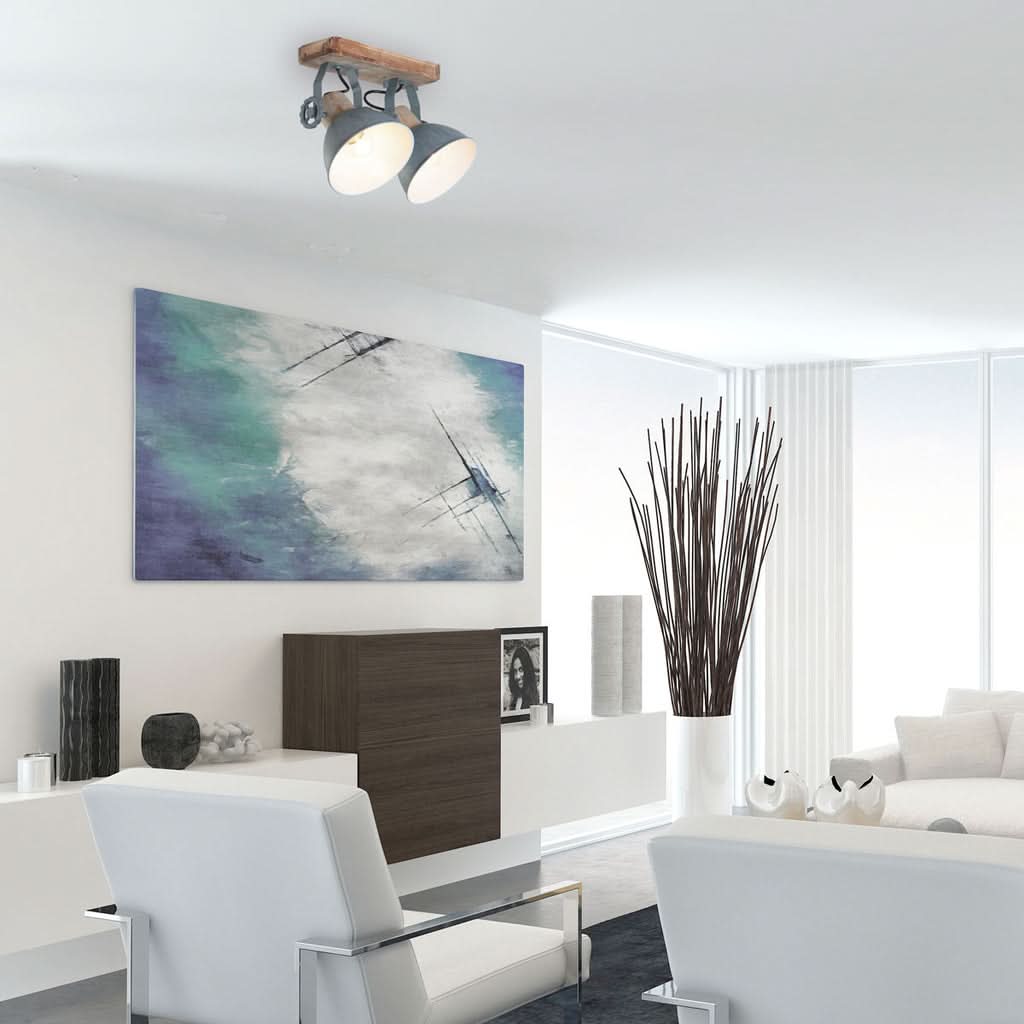 Mise en ambiance du plafonnier allumé au-dessus d'un salon contemporain blanc et épuré.