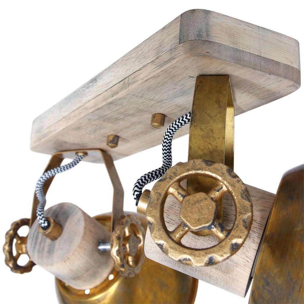 Dessous de la base en bois montrant attaches laiton et molettes de réglage des spots