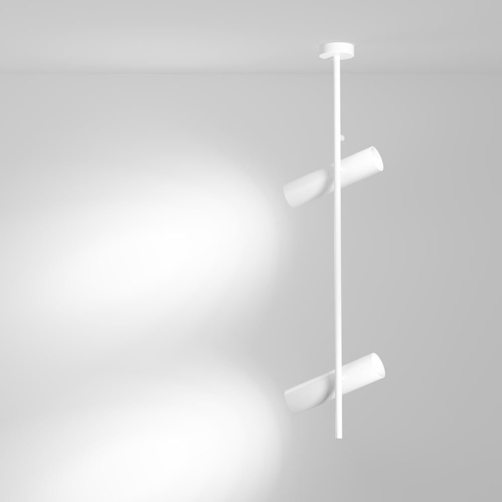 Mise en ambiance : deux halos lumineux projetés sur un mur gris clair