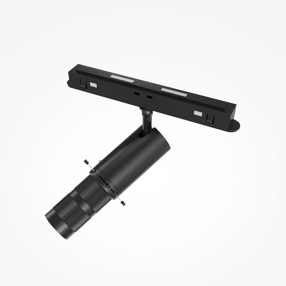 Détail de l'adaptateur de rail noir et du projecteur orientable vers le bas