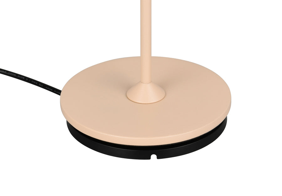 Gros plan sur la base beige et le socle de charge noir