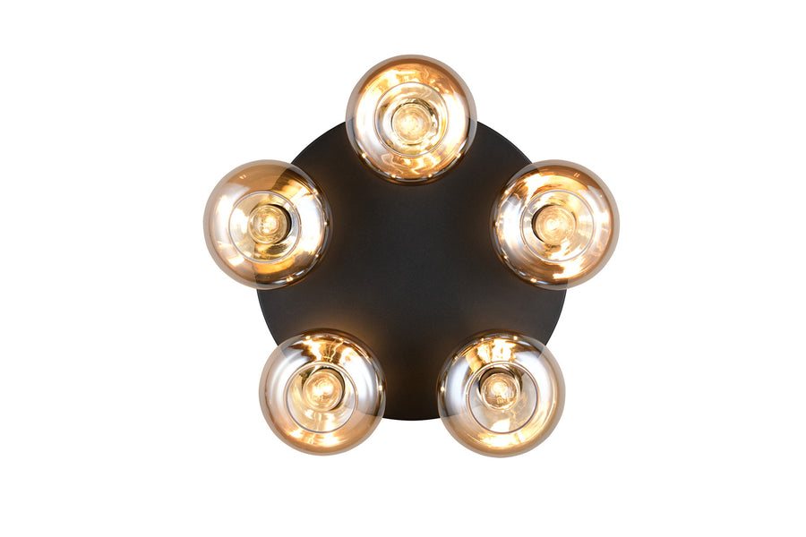 Vue de dessous montrant la répartition circulaire des cinq luminaires