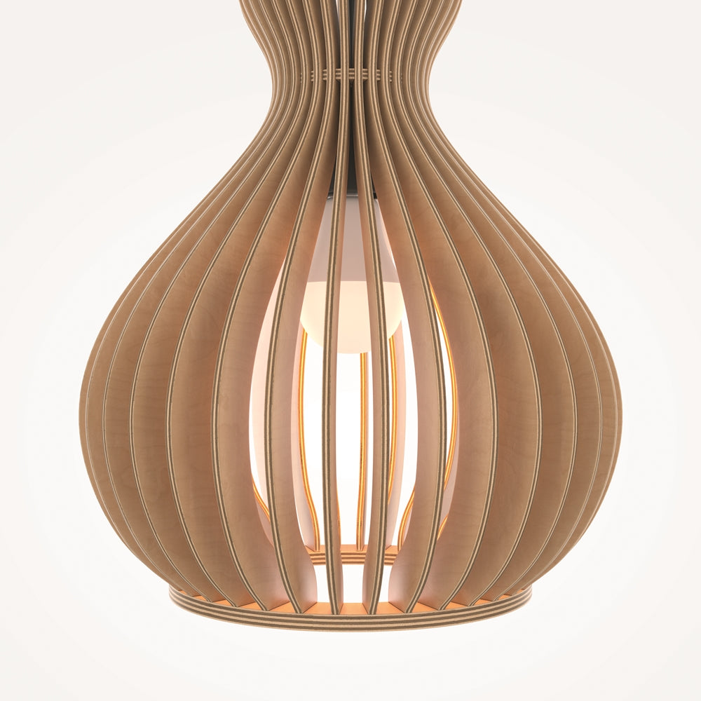 Vue rapprochée de l'abat-jour ajouré avec ampoule allumée diffusant une lumière chaude