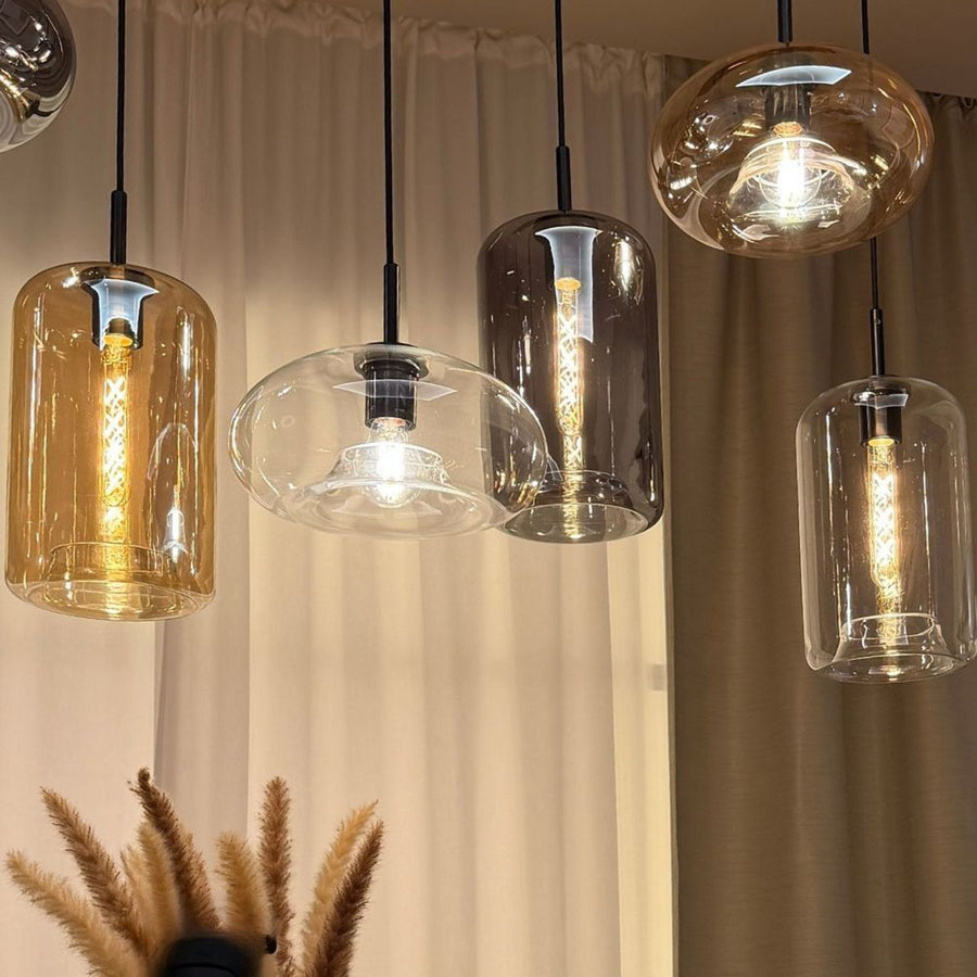 Détail des verres transparents et fumés, douilles noires et ampoules visibles