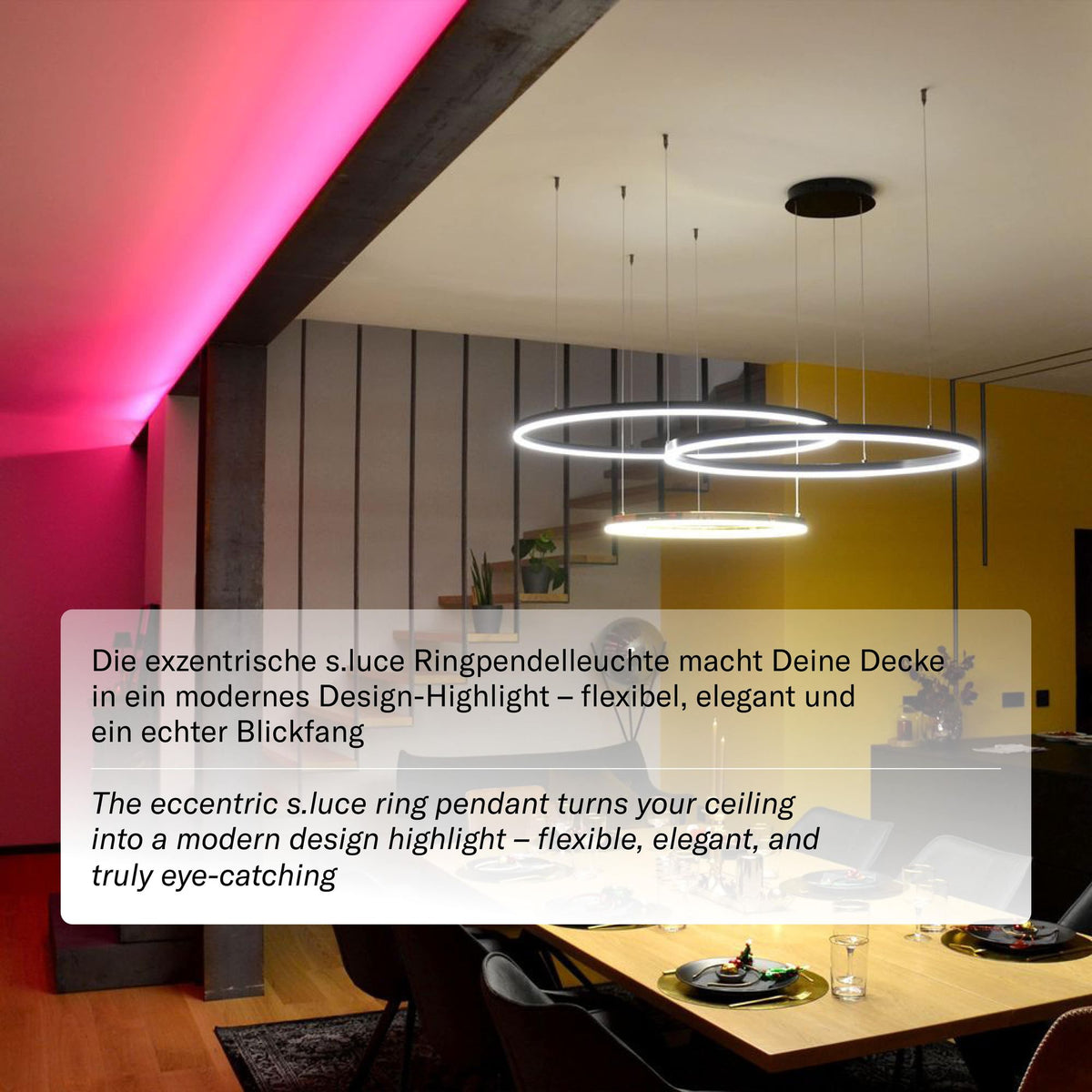 Mise en ambiance moderne avec éclairage rose et suspension à anneaux au plafond.