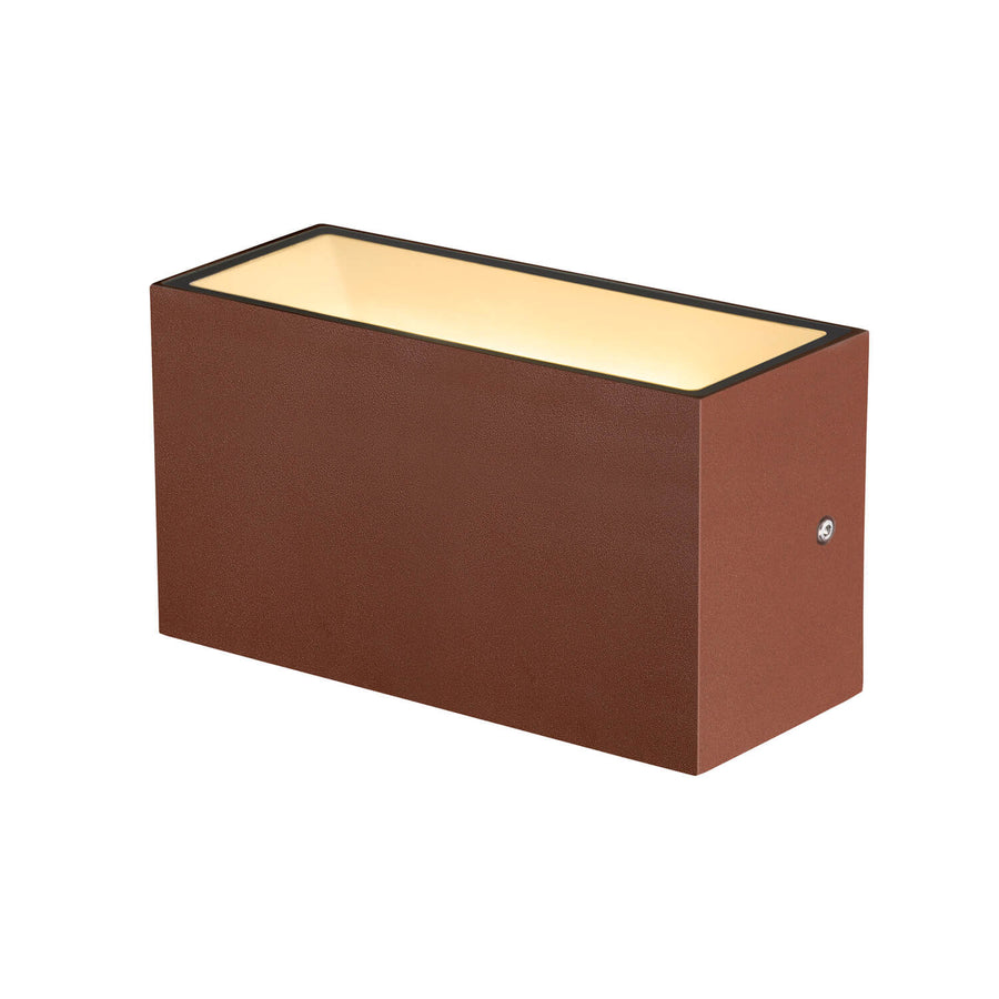 Vue en plongée sur le dessus de l'applique, verre opale illuminé encadré de rouille.