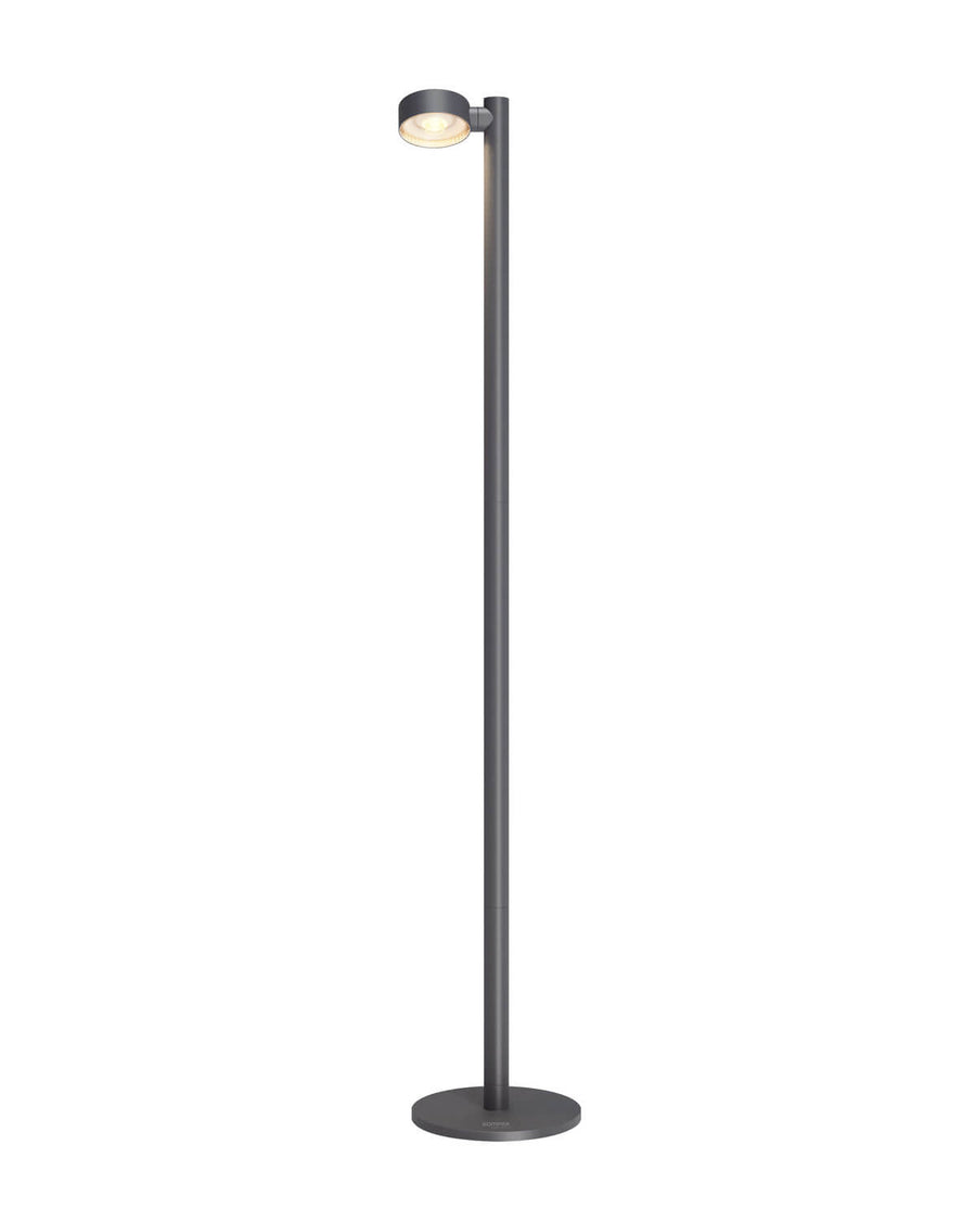 Vue de profil du luminaire sur socle rond, tige verticale fine
