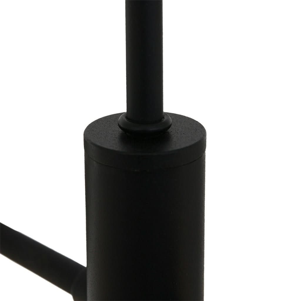 Zoom sur le corps central cylindrique noir et la tige de fixation