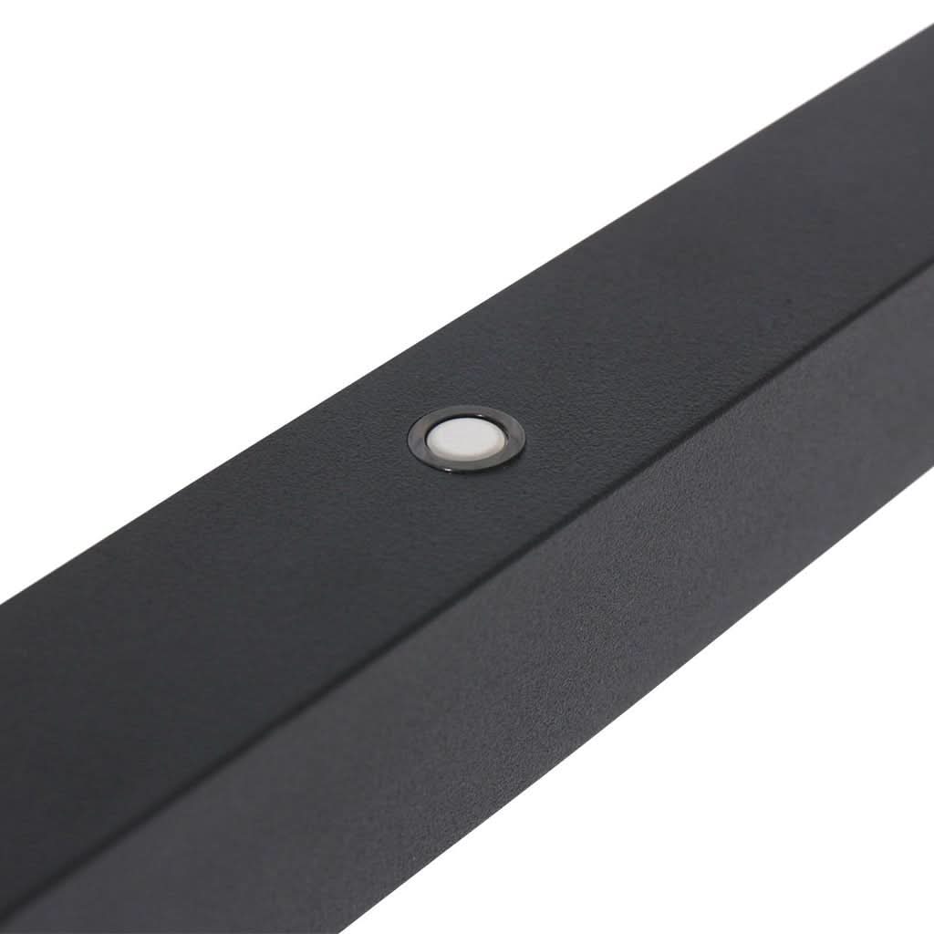 Détail de la finition noire mate avec petit insert circulaire blanc sur le profil
