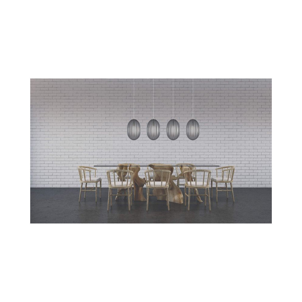 Mise en ambiance au-dessus d'une table de salle à manger devant un mur de briques blanches