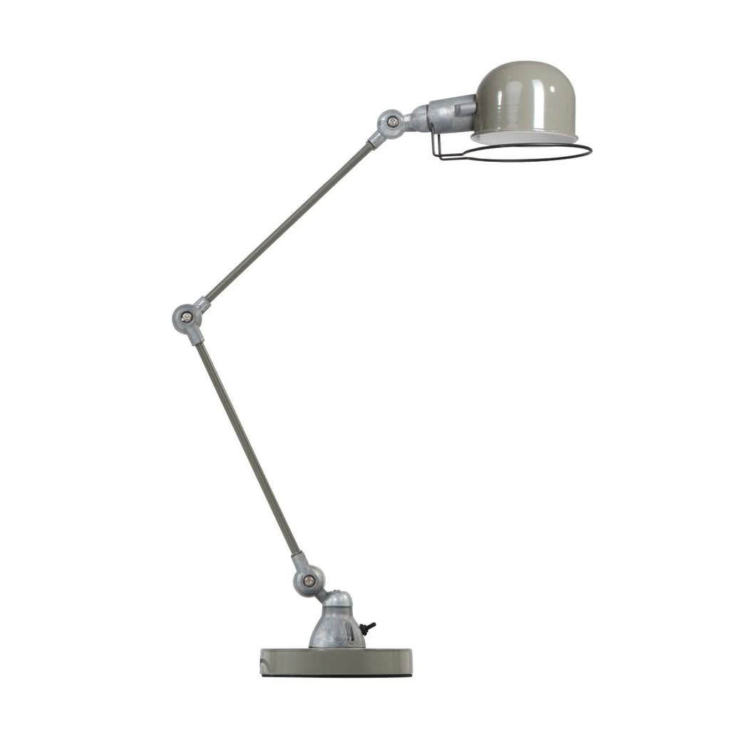 Vue d'ensemble de la lampe métallique verte avec bras pliants et réflecteur.