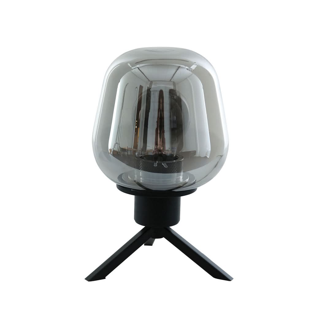 Même lampe de table sur fond blanc, ampoule éteinte, abat-jour en verre fumé transparent.