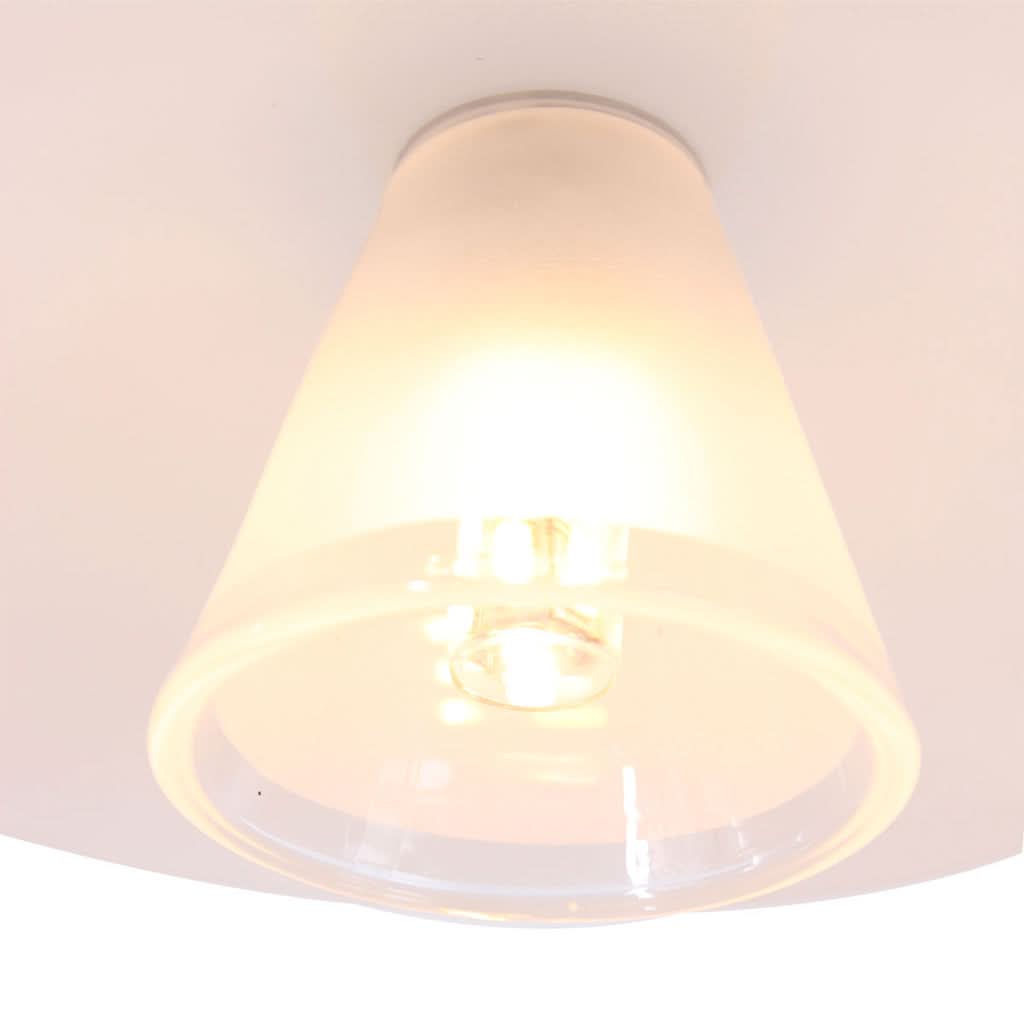 Détail de la lumière LED diffusée sous l'abat-jour, vue en contre-plongée