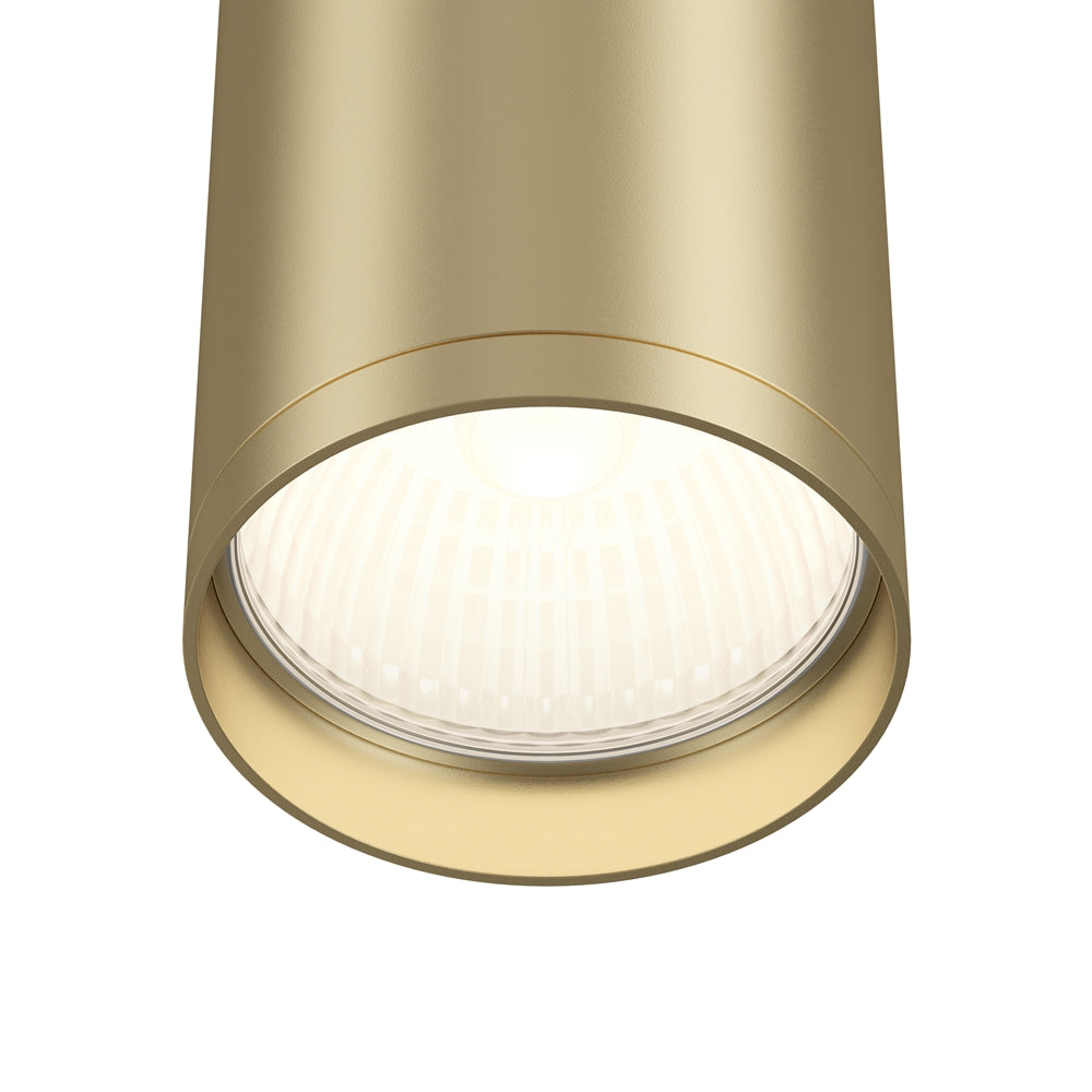 Détail du bas du cylindre doré montrant le diffuseur et les LED