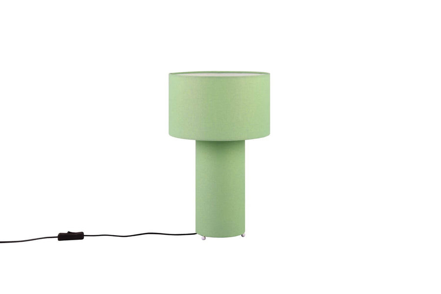 Lampe cylindrique verte éteinte, texture du tissu visible sur fond blanc