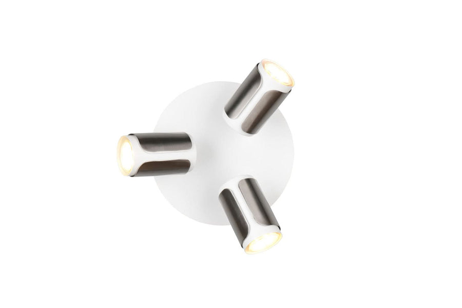 Vue en plongée du luminaire rond équipé de trois spots cylindriques orientables.
