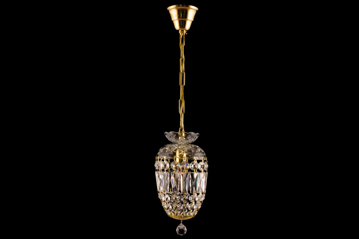 Vue d'ensemble de la suspension dorée avec sa chaîne et son cabochon de plafond