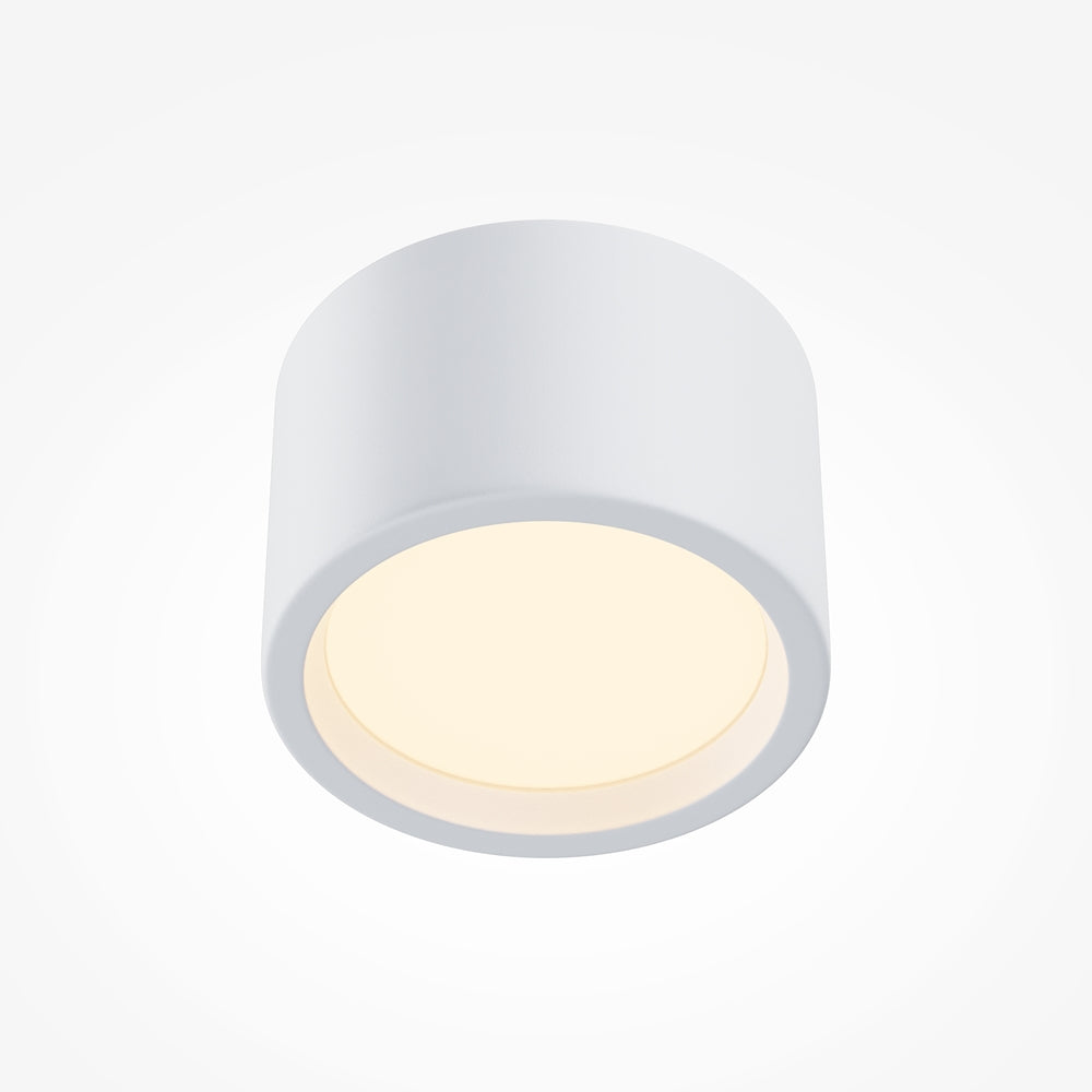 Détail rapproché du diffuseur rond et de la lumière chaude