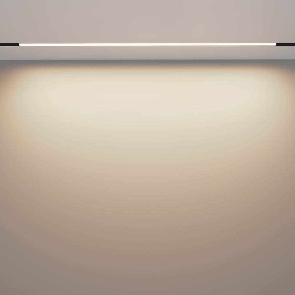 Mise en ambiance d'un mur recevant un halo lumineux diffus sous le rail fin