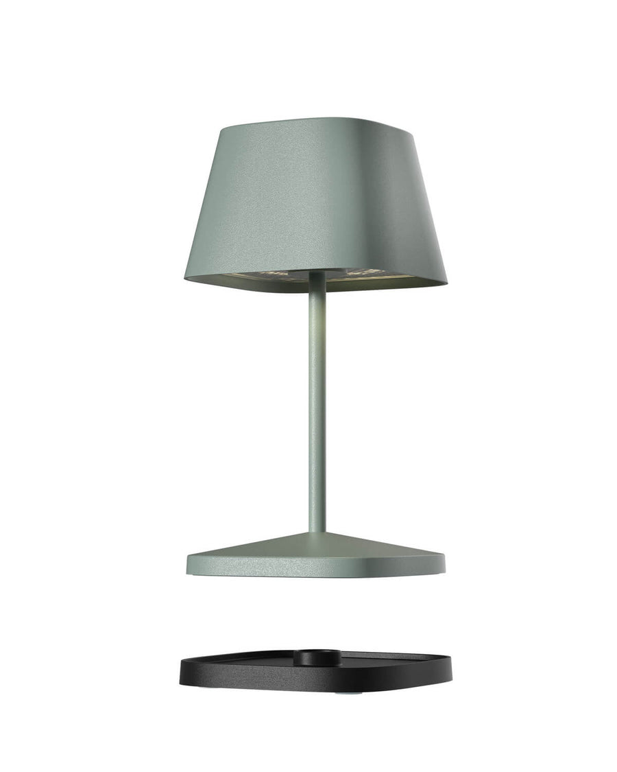 Vue éclatée du luminaire montrant la base et sa platine inférieure noire