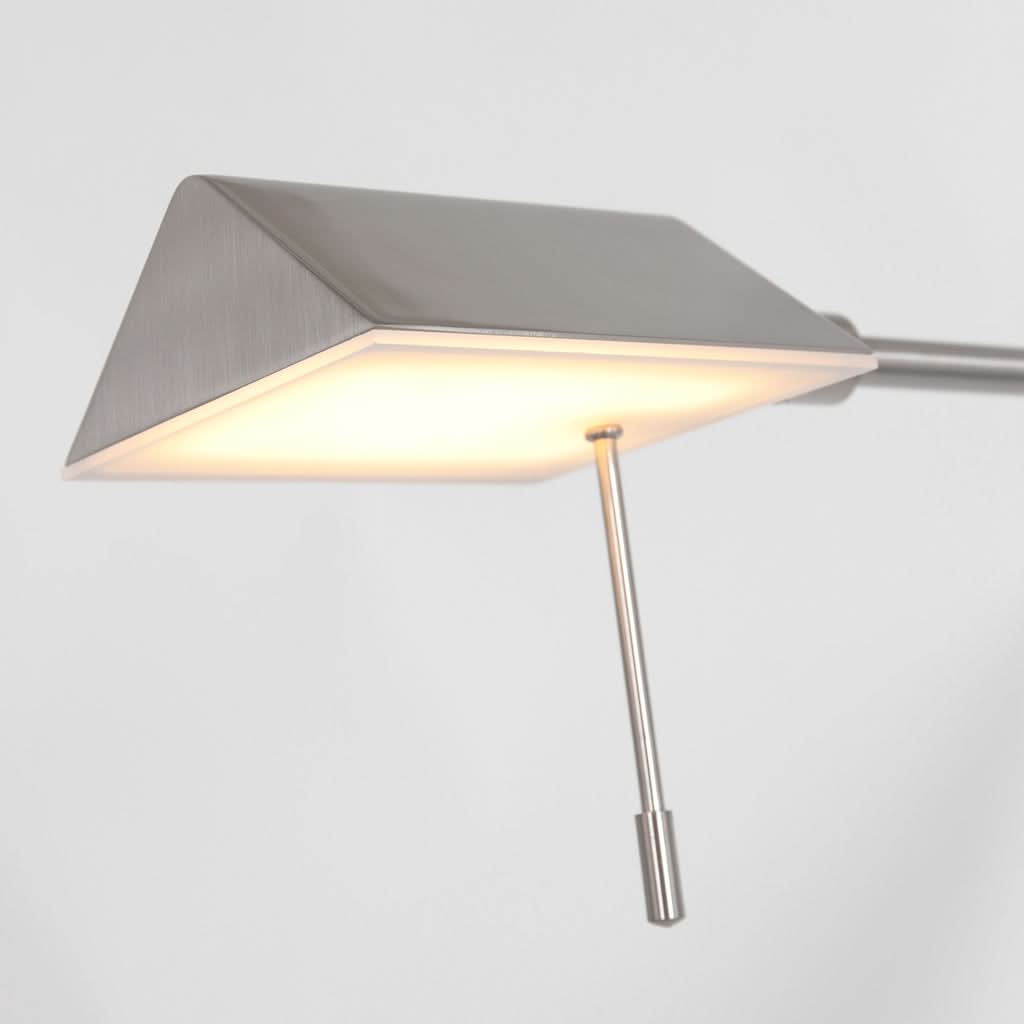 Détail de l'abat-jour allumé, lumière chaude diffusée sous la coupelle
