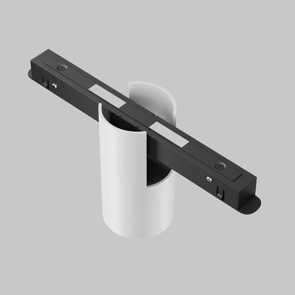 Détail de l'adaptateur noir et du module cylindrique en vue éclatée
