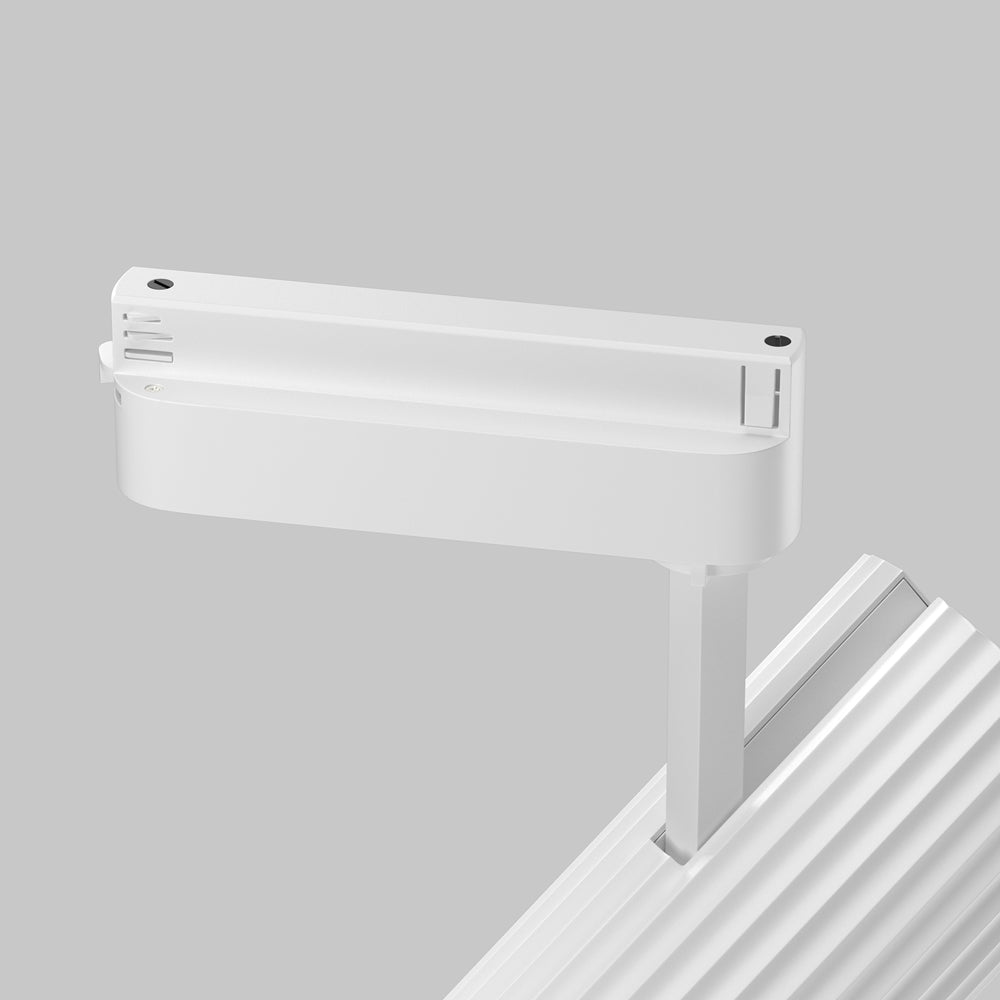 Détail du raccord articulé et de l'adaptateur fixé sur le rail