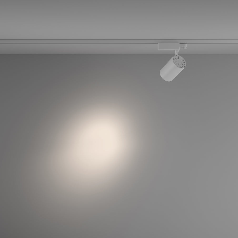Mise en ambiance, halo lumineux diffus projeté sur un mur par le spot
