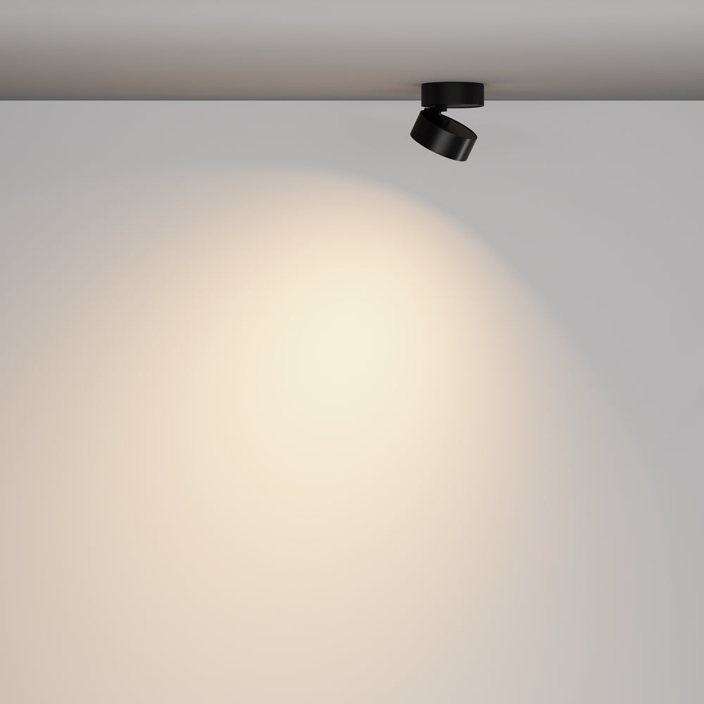 Vue en situation, halo lumineux diffusé sur le mur par le spot